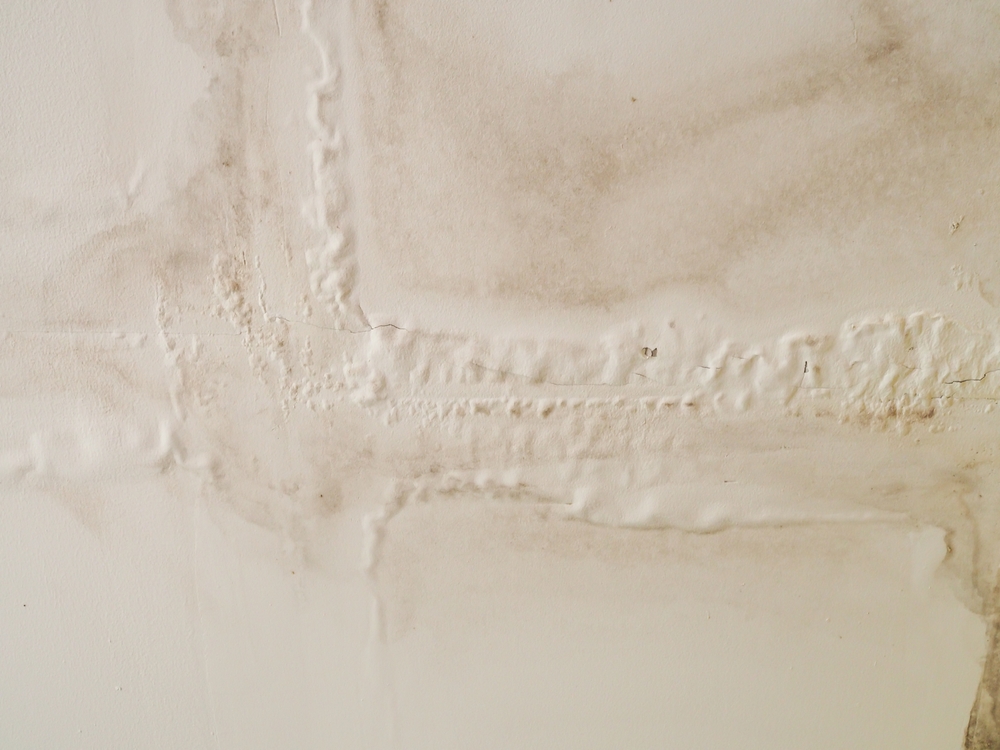 A water damaged ceiling section