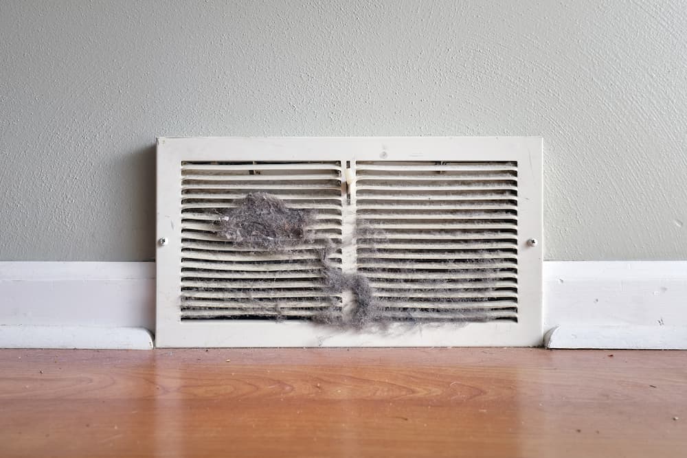 close up image of a dirty air vent
